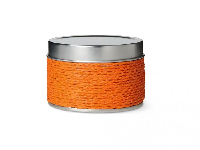 Candle in decorative tin box