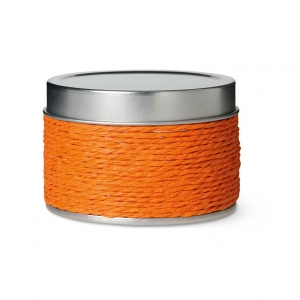 Candle in decorative tin box